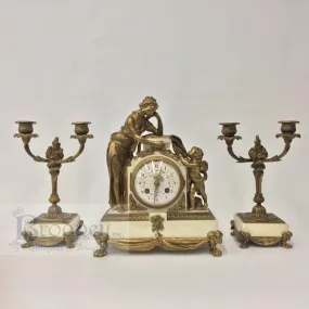 French Three Piece Bronze and Marble Clock Garniture