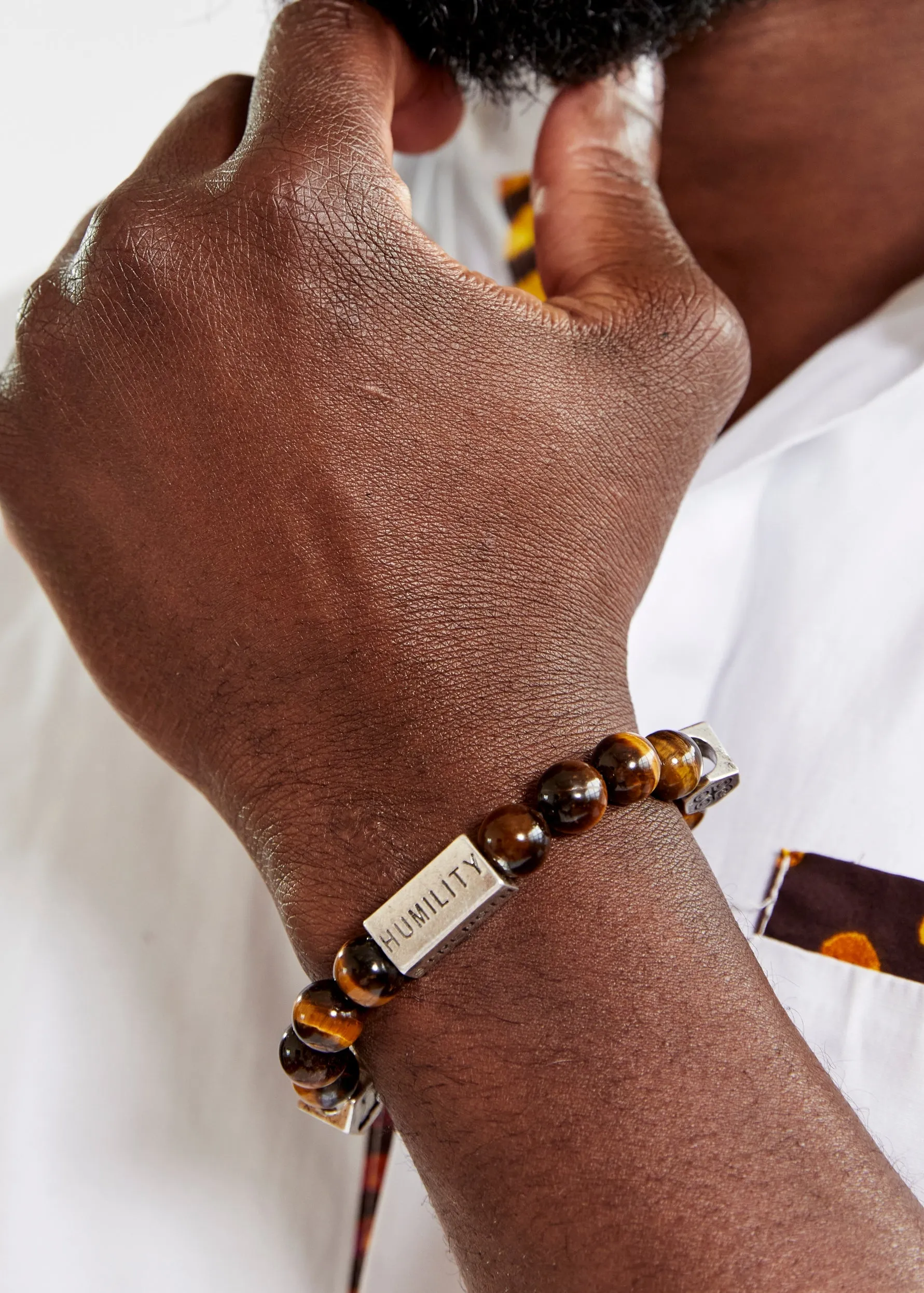 Irele Beaded Humility and Strength Adinkra Symbol Bracelet (Brown)